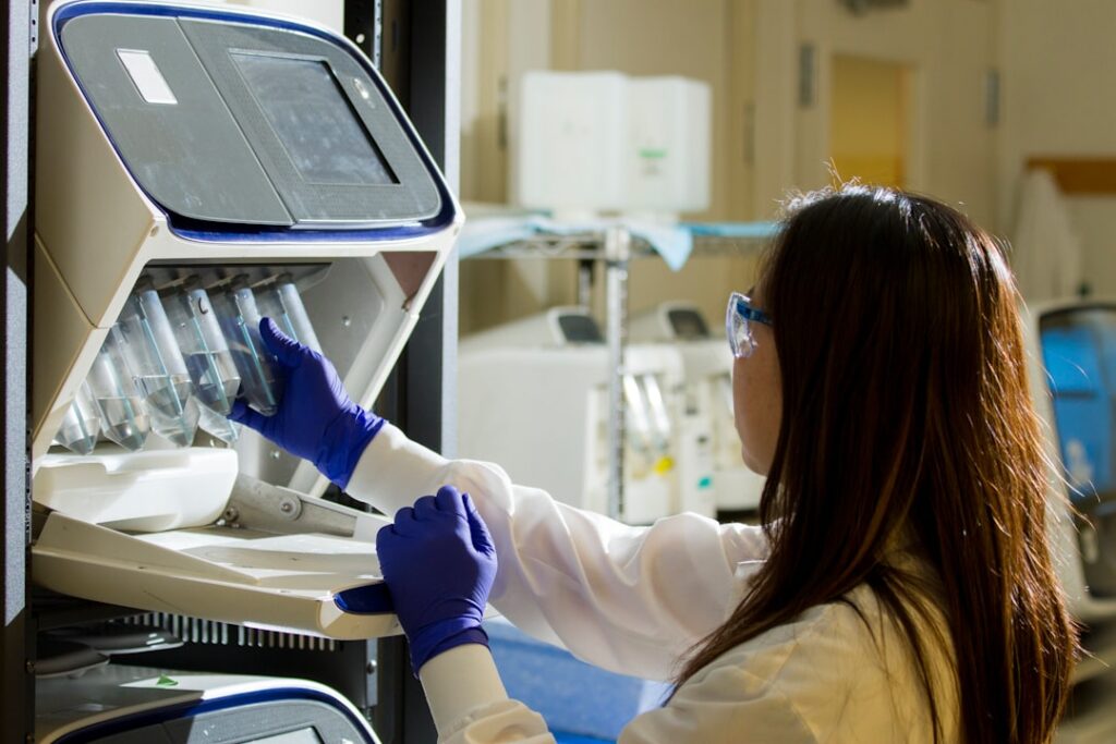 DNA Genotyping and Sequencing. Technician prepares for a viral whole-genome sequencing experiment at the Cancer Genomics Research Laboratory, part of the National Cancer Institute'
