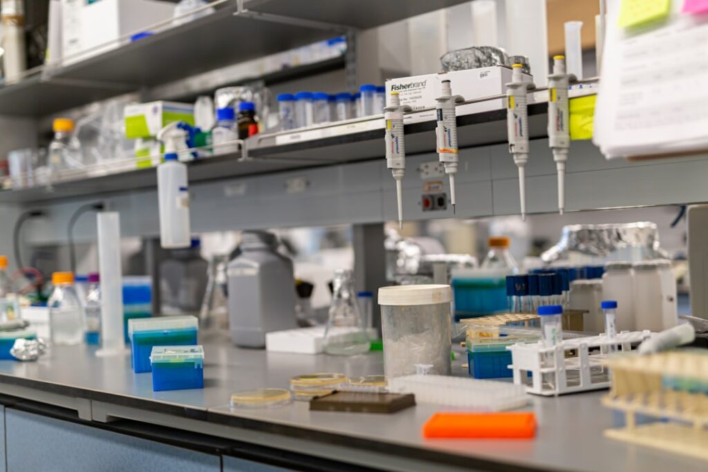 A laboratory bench is full of scientific equipment